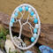 side view of summer beaded and wire wrapped tree summertime vibes sky blue colors 